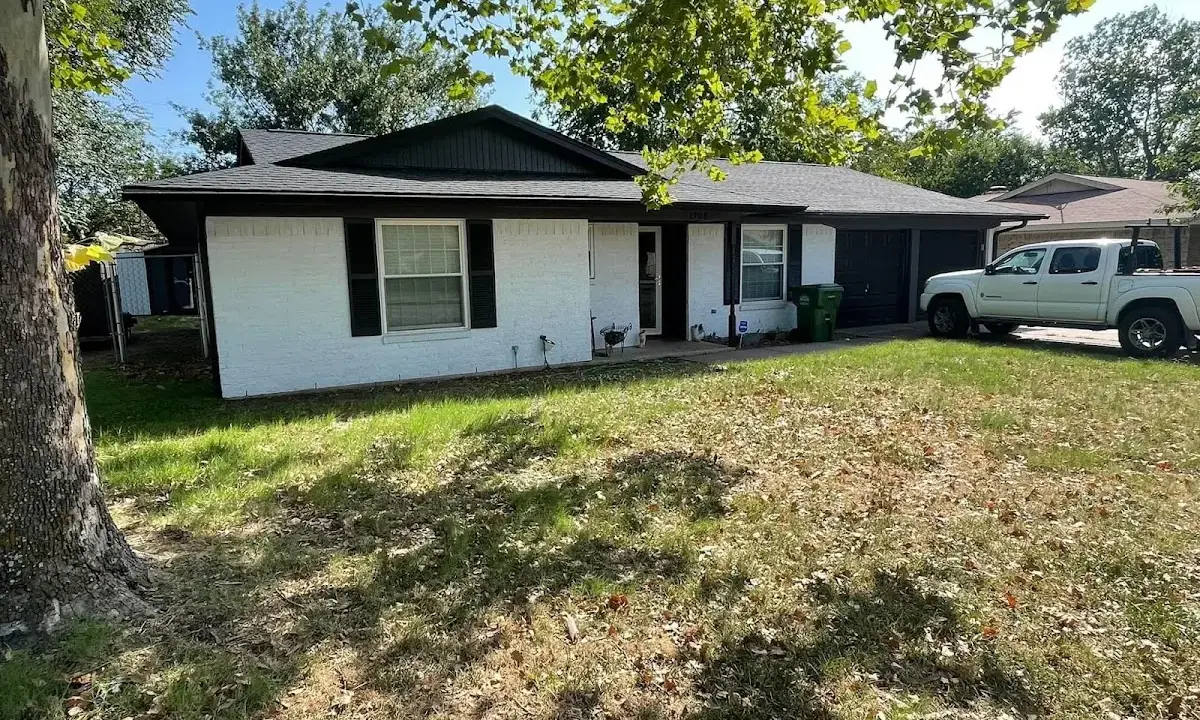 Professional roofing crew working on a residential roof in Wrightsboro